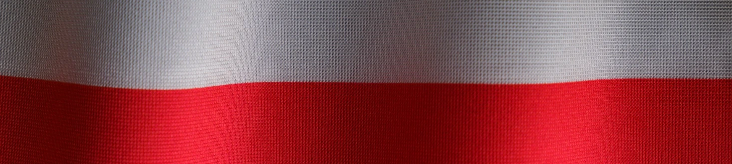 a close up of a red and white curtain